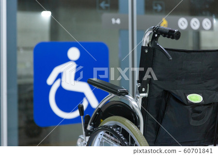 Disabled handicapped man sitting on wheelchair 139 Disabled handicapped man sitting on wheelchair 139 60701841