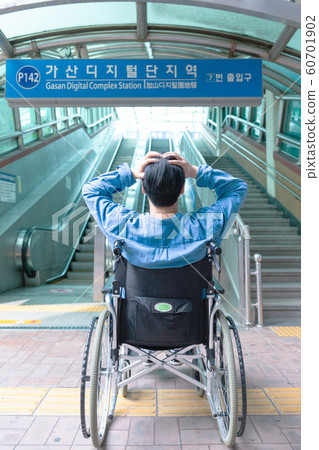 Disabled handicapped man sitting on wheelchair 094 Disabled handicapped man sitting on wheelchair 094 60701902