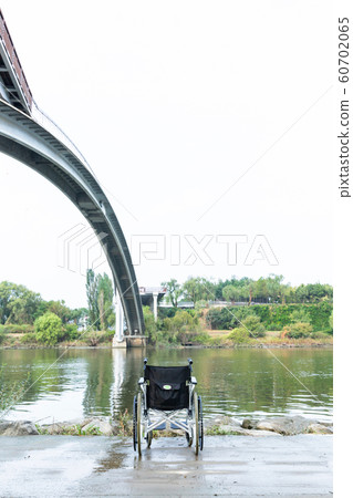 Disabled handicapped man sitting on wheelchair 085 60702065