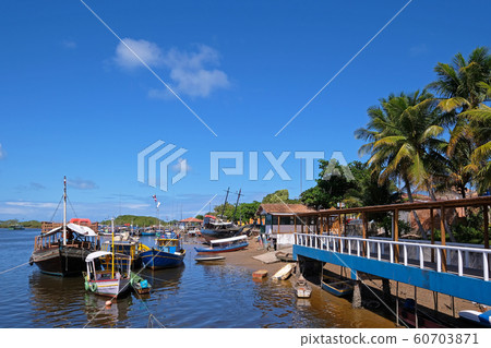 Colorful boats and ships at the little harbor of Santa Cruz Cabralia, Bahia, Brazil Colorful boats and ships at the little harbor of Santa Cruz Cabralia, Bahia, Brazil 60703871