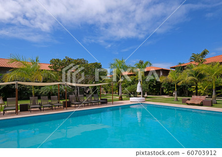 Poolside of a luxury tropical hotel resort near Porto Seguro, Bahia, Brazil Poolside of a luxury tropical hotel resort near Porto Seguro, Bahia, Brazil 60703912