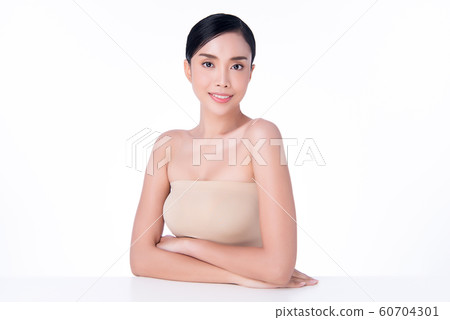 Beautiful Young Asian Woman with Clean Fresh Skin. Beautiful Young Asian Woman with Clean Fresh Skin. 60704301