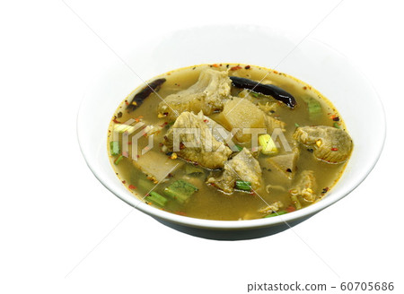 hot and spicy beef with tamarind and Thai herbs soup on bowl hot and spicy beef with tamarind and Thai herbs soup on bowl 60705686