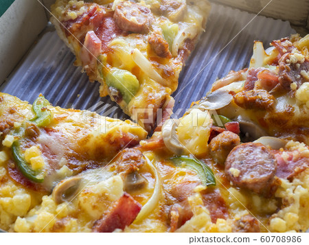 Close up of Pizza in a delivery cardboard box Close up of Pizza in a delivery cardboard box 60708986