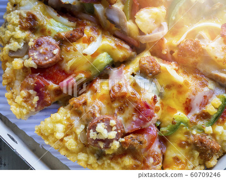 Close up of Pizza in a delivery cardboard box Close up of Pizza in a delivery cardboard box 60709246