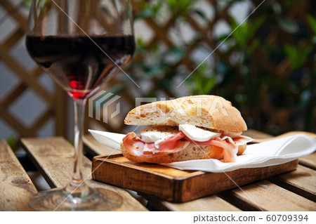 Italian sandwich with Parma's ham and mozzarella 60709394