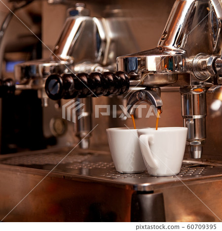 Italian expresso machine with two cups. Italian expresso machine with two cups. 60709395