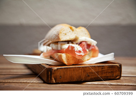 Italian sandwich with Parma's ham and mozzarella 60709399