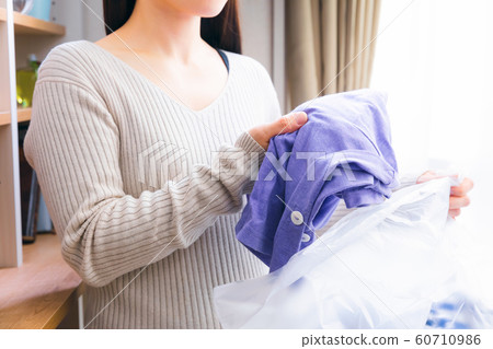 Women who throw away clothes recycle recycle 60710986