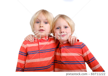 Two caucasian boys brothers posing in studio Two caucasian boys brothers posing in studio 60711222