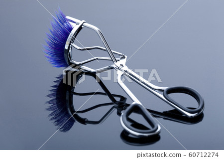 False eyelashes and eyelash curler. False eyelashes and eyelash curler. 60712274