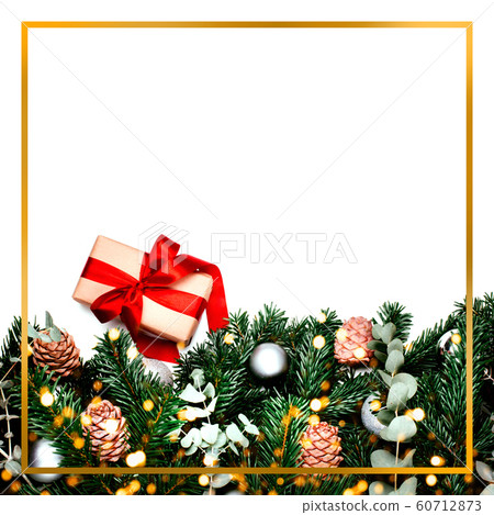 Gift in paper wrapping with red bow and frame. 60712873