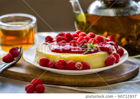 Cheesecake with raspberry sauce Cheesecake with raspberry sauce 60712937