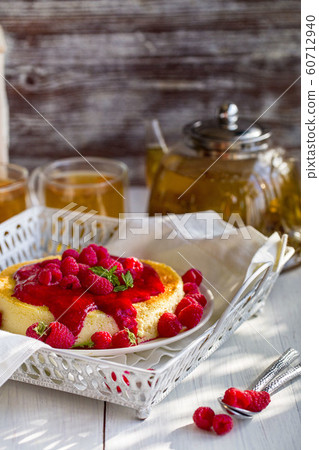 Cheesecake with raspberry sauce 60712940