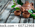 Tea and spring blossom background 60712968