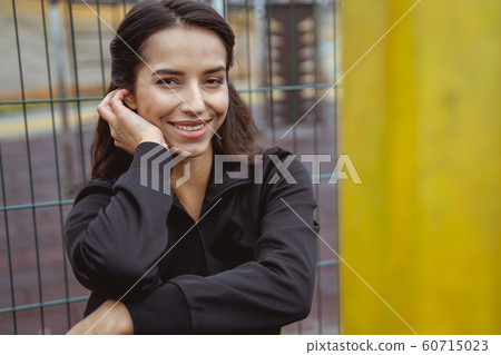 Close up of cute female that demonstrating her smile Close up of cute female that demonstrating her smile 60715023