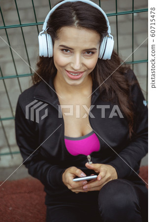 Portrait of pretty girl that looking at camera Portrait of pretty girl that looking at camera 60715478