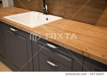 Interior of modern kitchen and ceramic sink and 60716607