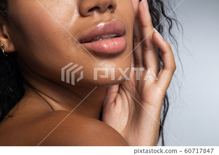 Cropped photo of pretty Afro American lady indoors 60717847