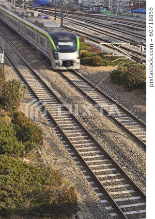 Meeting and leaving, trains leaving many stories and stories, parallel lines that never meet, 60718856