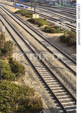 Meeting and leaving, trains leaving many stories and stories, parallel lines that never meet, 60718857