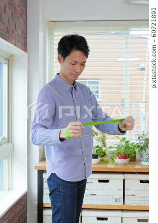 Men exercising in the room Men exercising in the room 60721891