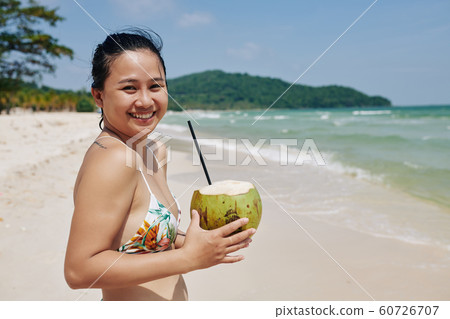 Pretty woman with fresh cocktail Pretty woman with fresh cocktail 60726707