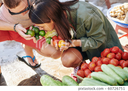 Couple smelling limes Couple smelling limes 60726751