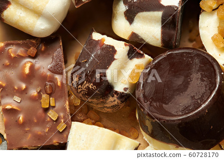 Homemade chocolate candies on rustic table, sweet Homemade chocolate candies on rustic table, sweet 60728170