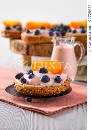 Closeup view of sweet buns with yogurt 60729622