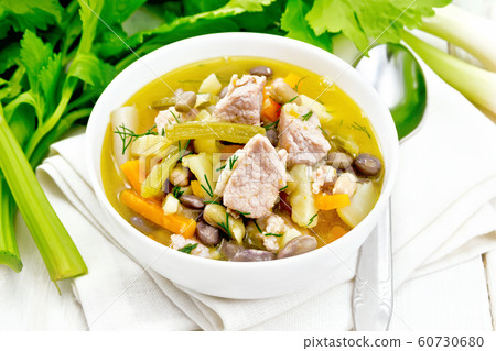 Soup Eintopf in bowl on white board 60730680