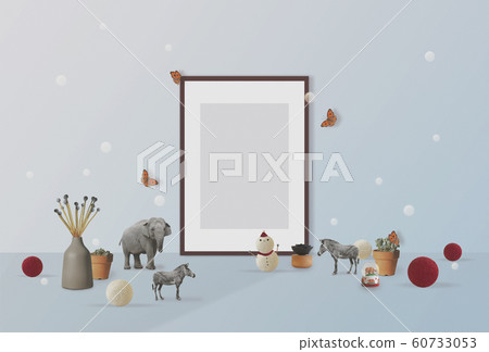 A cute little object in an interior room with a picture frame 60733053