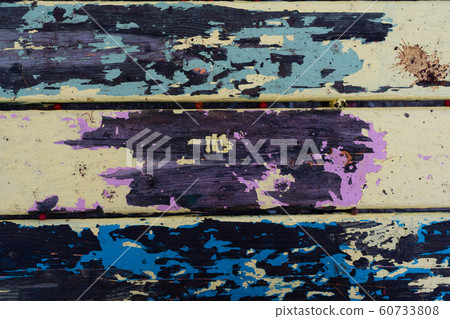 Multicolored wooden background. Painted, peeled wood texture. Background photo 60733808