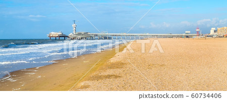 North Sea beach and Scheveningen Pier near Hague, Holland North Sea beach and Scheveningen Pier near Hague, Holland 60734406
