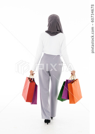 Muslim girl shopping bags 60734678