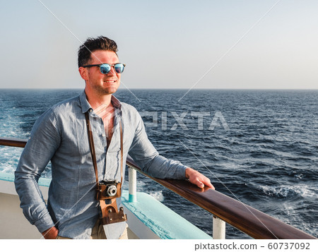 Man on the empty deck of a cruise liner Man on the empty deck of a cruise liner 60737092