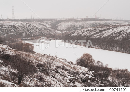 Winter beautiful landscape near frozen river. 60741501