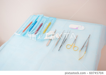 Tools for the periodontist.Scalers in stomatology.Multi-colored dental curettes. Curettes for dental fillings. Dental probes.Bilateral stomatologic probes. Dentistry. 60745704