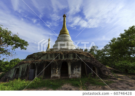 The pagoda has a golden peak at the Po Win Daung Caves consisting of many sandstone caves, Myanmar. 60746428
