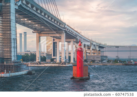 Small Red metal lighthouse under Yokohama bridge Small Red metal lighthouse under Yokohama bridge 60747538