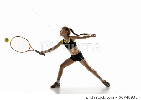 Little caucasian girl playing tennis isolated on white background 60748933