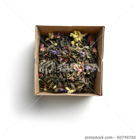 Green tea with aromatic additives. Top view on white background Green tea with aromatic additives. Top view on white background 60749788