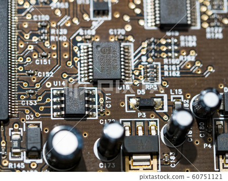 Closeup of computer micro circuit board with integrated chipset Closeup of computer micro circuit board with integrated chipset 60751121
