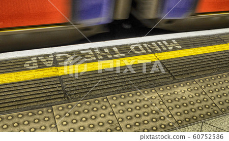 London metro writing "mind the gap" London metro writing "mind the gap" 60752586