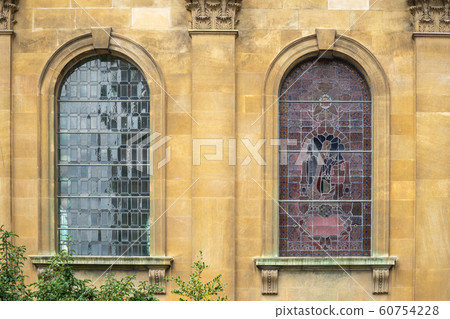 Stained glass.Stained glass windows were commonly used in churches for decorative and informative purposes. Stained glass.Stained glass windows were commonly used in churches for decorative and informative purposes. 60754228