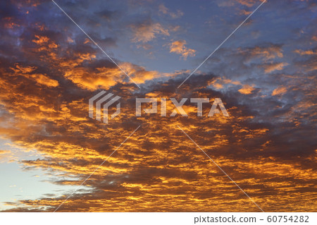 Dramatic orange sunrise sky 60754282