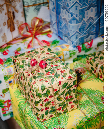Festively wrapped Christmas presents. Close-up. 60759992