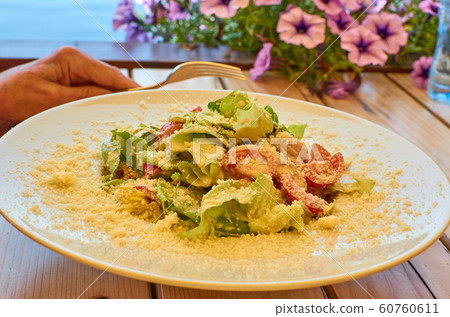 Served Caesar salad Served Caesar salad 60760611