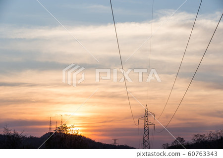 high voltage post,High voltage tower sky sunset 60763343