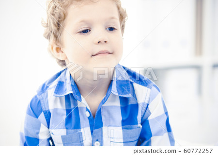 Doctor and patient child. Physician examining little boy. Regular medical visit in clinic. Medicine and health care concept 60772257